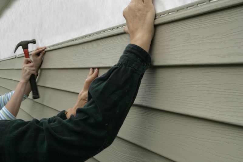 Final Inspection of Vinyl Siding Repair